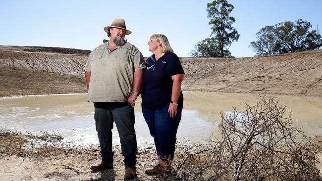 Farmers Richard and Diane Darcy … more evaporation is expected due to warmer autumn temperatures. Picture: Jonathan Ng