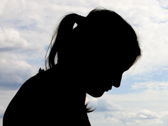 silhouette of female with sky