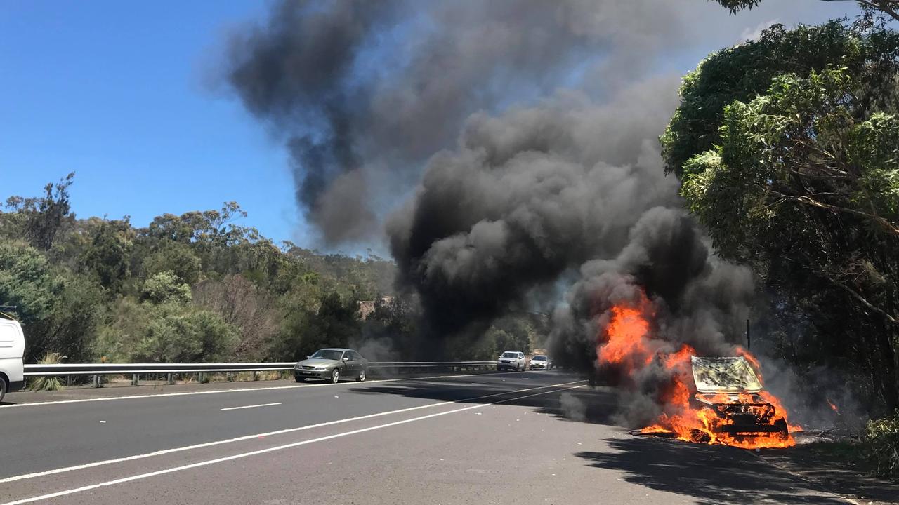 The couple’s car was engulfed in flames in a matter of minutes.