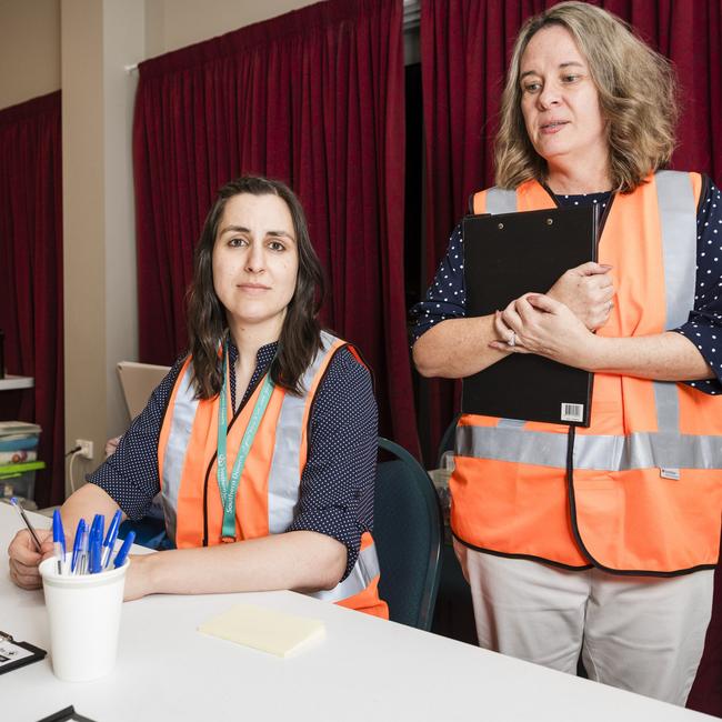 Southern Downs Regional Council community services team members Nicola Featherstone (left) and Sue Organ prepare to welcome Wallangarra residents to the evacuation centre in Stanthorpe, Tuesday, October 31, 2023. Picture: Kevin Farmer