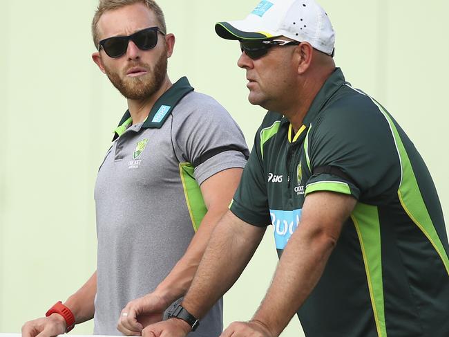 ROSEAU, DOMINICA - JUNE 04: Australian Team Manager Gavin Dovey and Australian coach Darren Lehmann look on during day two of the First Test match between Australia and the West Indies at Windsor Park on June 4, 2015 in Roseau, Dominica. (Photo by Ryan Pierse/Getty Images)