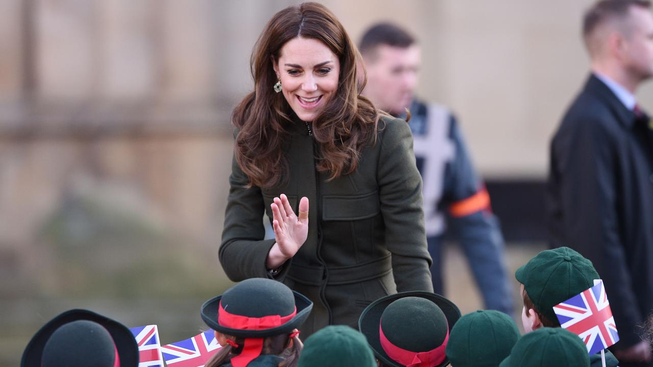 The Duchess of Cambridge waved to schoolchildren after visiting the City Hall in Bradford. Picture: AFP/Oli Scarff