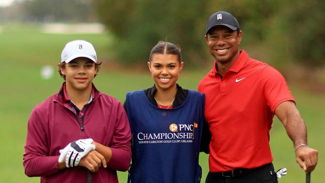 Charlie, Sam and Tiger Woods. Mike Ehrmann/Getty Images/AFP.