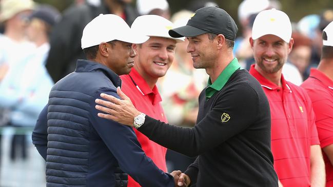 Tiger Woods and Adam Scott at Royal Melbourne during the 2019 Presidents Cup. Picture: AAP Image/Rob Prezioso