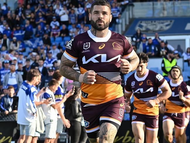 SYDNEY, AUSTRALIA - JULY 15: Adam Reynolds Captain and team players of the Broncos walk into the field prior to the round 20 NRL match between Canterbury Bulldogs and Brisbane Broncos at Belmore Sports Ground on July 15, 2023 in Sydney, Australia. (Photo by Izhar Khan/Getty Images)