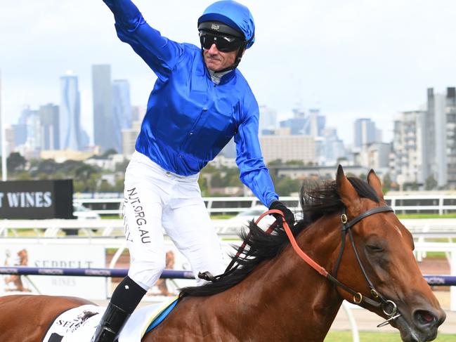 Glen Boss celebrates his Newmarket Handicap win on Bivouac. Picture: AAP