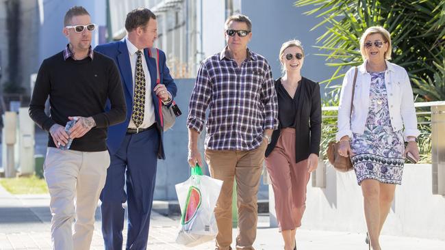 David Turner (left), husband of victim Kate Goodchild is seen arriving at the inquest into the Dreamworld disaster at the Southport Courthouse in June.