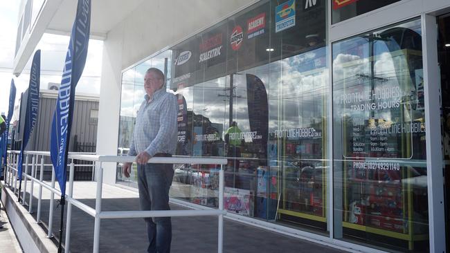 Frontline Hobbies owner Colin Scott at the front of his business at Broadmeadow.