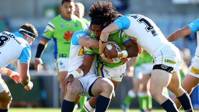 CANBERRA, AUSTRALIA — MAY 05: Iosia Soliola of the Raiders is tackled during the round nine NRL match between the Canberra Raiders and the Gold Coast Titans at GIO Stadium on May 5, 2018 in Canberra, Australia. (Photo by Mark Nolan/Getty Images)