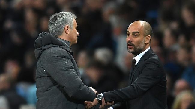 Pep Guardiola, Manager of Manchester City and Jose Mourinho, Manager of Manchester United.