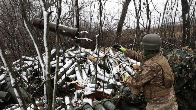 Ukrainian soldiers fire a M777 howitzer towards Russians on the frontline of eastern Ukraine. Picture: Anatolii Stepanov/AFP