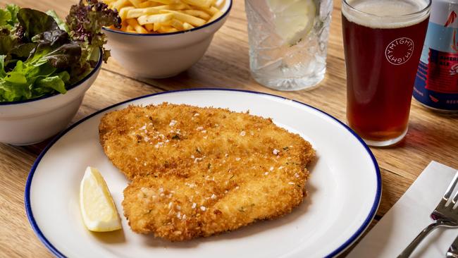 The sign of any great pub — the schnitzel is an absolute knockout. Picture: Jake Nowakowski