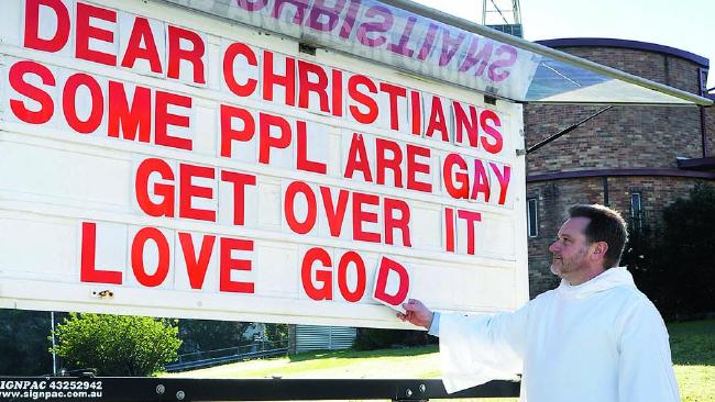 One sign propelled Fr Bower into a social media sensation. Picture: Peter Clark