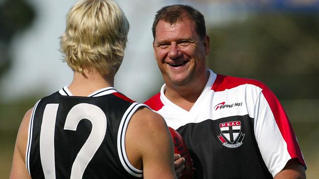 Grant Thomas and Nick Riewoldt in 2004. 