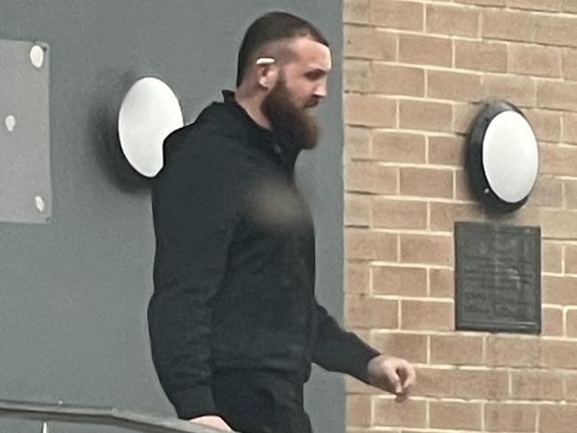 William Barry Payne, 25, of Hamlyn Terrace, leaving Wyong Local Court where he was sentenced for assault and reckless wounding. Picture: NewsLocal