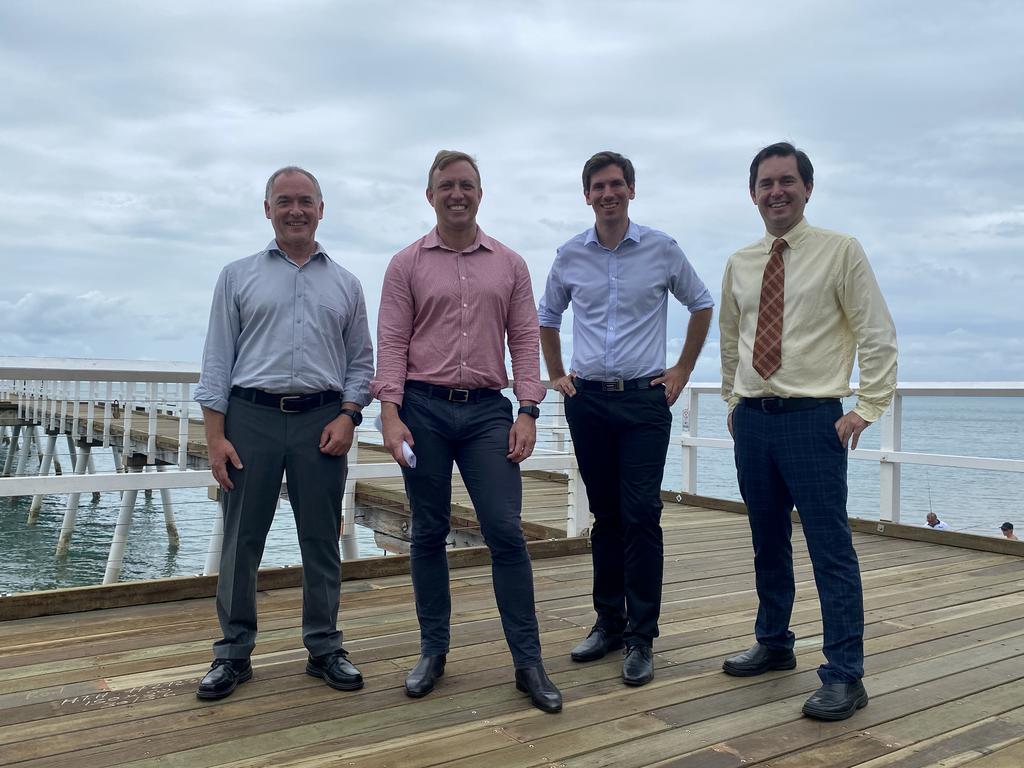 Member for Hervey Bay Adrian Tantari, Deputy Premier Steven Miles, Fraser Coast Mayor George Seymour and Member for Bundaberg Tom Smith on the newly repaired Scarness Jetty.