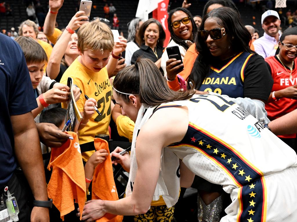 Caitlin Clark signing autographs after the Indiana Fever’s most recent win. Picture: Greg Fiume/Getty Images