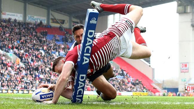 Joe Burgess with a spectacular touchdown.