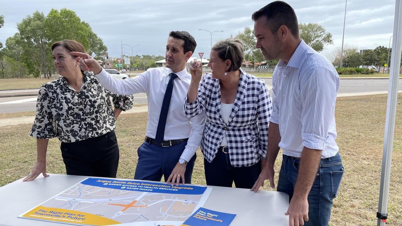 LNP candidate for Thuringowa, Leader of the Opposition David Crisafulli, candidate for Mundingburra Janelle Poole and candidate for Townsville Adam Baillie at the Angus Smith Drive roundabout.