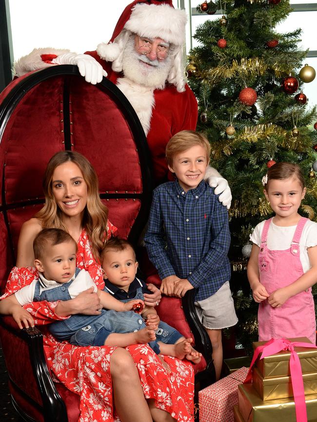 Bec poses for a happy Christmas 2017 snap with her children, twins Darcy and Tom and Oscar and Billie. Picture: Lawrence Pinder