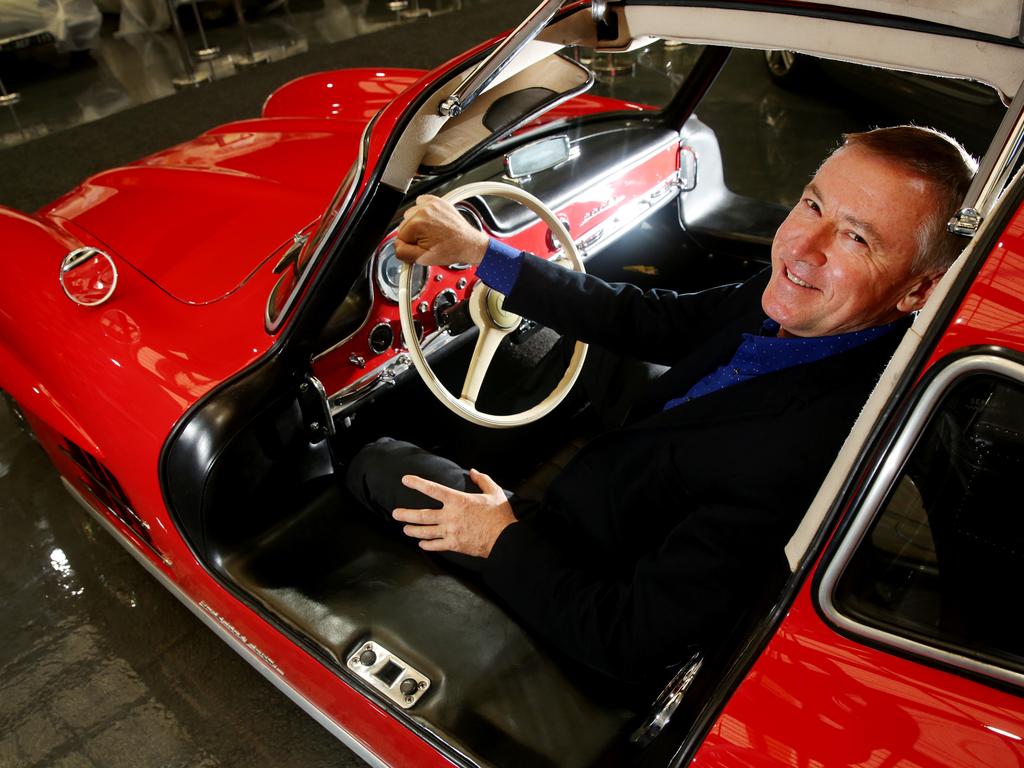 2Gosford Classic Car Museum owner Tony Denny pictured with 300SLGulling 1955 at the new museum West Gosford which is opening on Saturday May 28. Picture: Sue Graham`