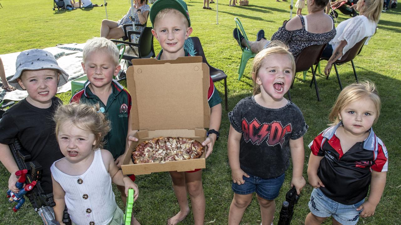 (from left) Eli Jeffery, Chase Sinclair, Harlow Jeffery, Nate Sinclair, Callie Barker and Haidee Barker, ready for pizza at the Toowoomba Street Food Festival at Pittsworth. Saturday, January 29, 2022. Picture: Nev Madsen.