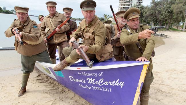 Pictured at Tweed Heads doing a Surf Boat re-enactment of the Gallipoli landings. Men in Authentic Australian soldier costumes . Picture Mike Batterham