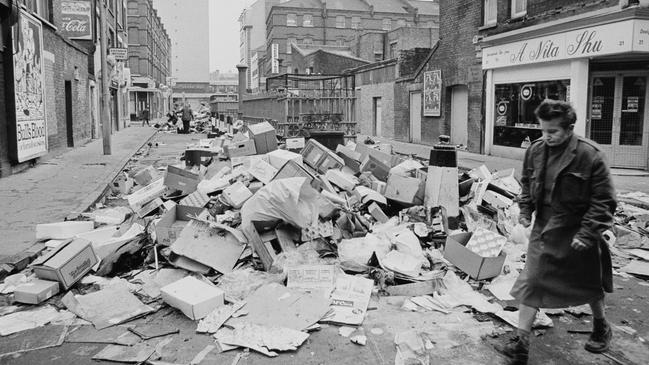 Scenes of temporary ruin: A man walks past a pile of rubbish in London as waste collectors were on strike for a pay rise in 1979. Picture: Maurice Hibberd/Evening Standard/Hulton Archive/Getty Images