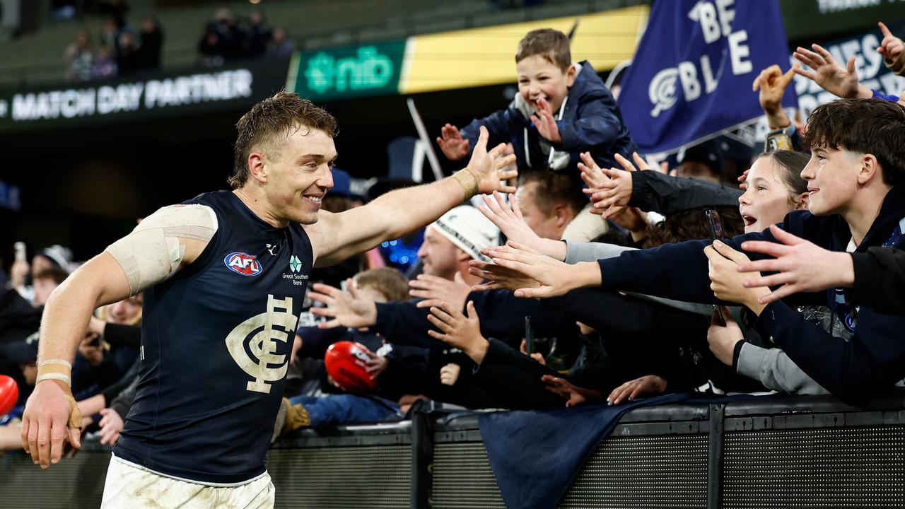 Cripps celebrates with fans after the dominant performance. (Photo by Michael Willson/AFL Photos via Getty Images)