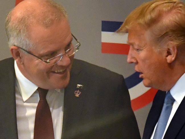 U.S. President Donald Trump and Australia's Prime Minister Scott Morrison leave together after a meeting during the G7 Summit in Biarritz. Picture: AAP