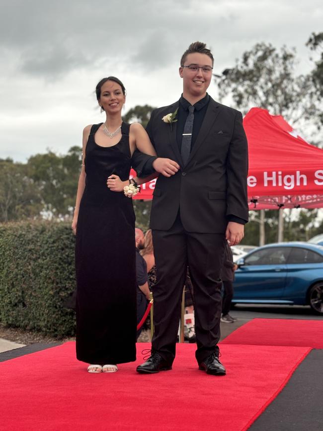 The students of Urangan State High School arriving at their formal.