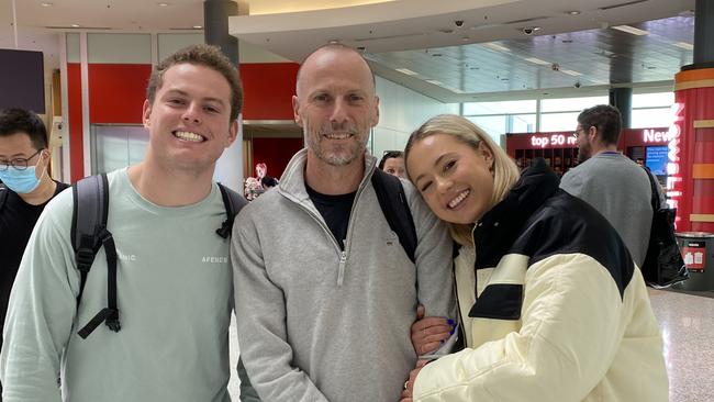 Last photo taken of Xavier O'Grady with his dad Patrick and his eldest sister Gabriella at the airport, 24 hours before he died. Picture: Supplied