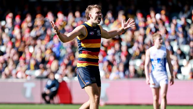 Riley Thilthorpe celebrates a goal against the Roos. Picture: James Elsby/AFL Photos via Getty Images