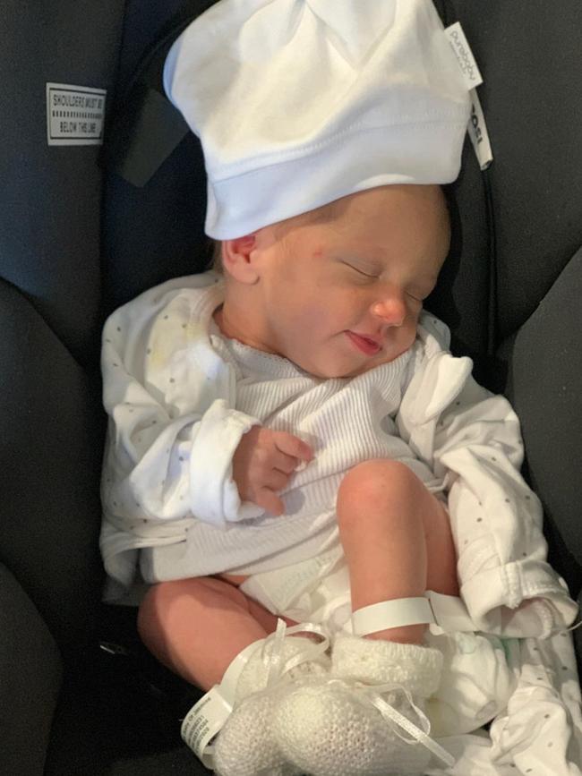 Karl Stefanovic and Jasmine Yarbrough ride home from hospital with their newborn baby Harper.