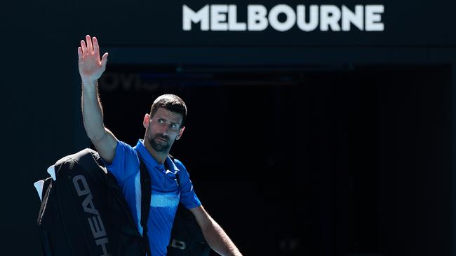 Djokovic waves goodbye to the Aus Open crowd. (Photo by Darrian Traynor/Getty Images)