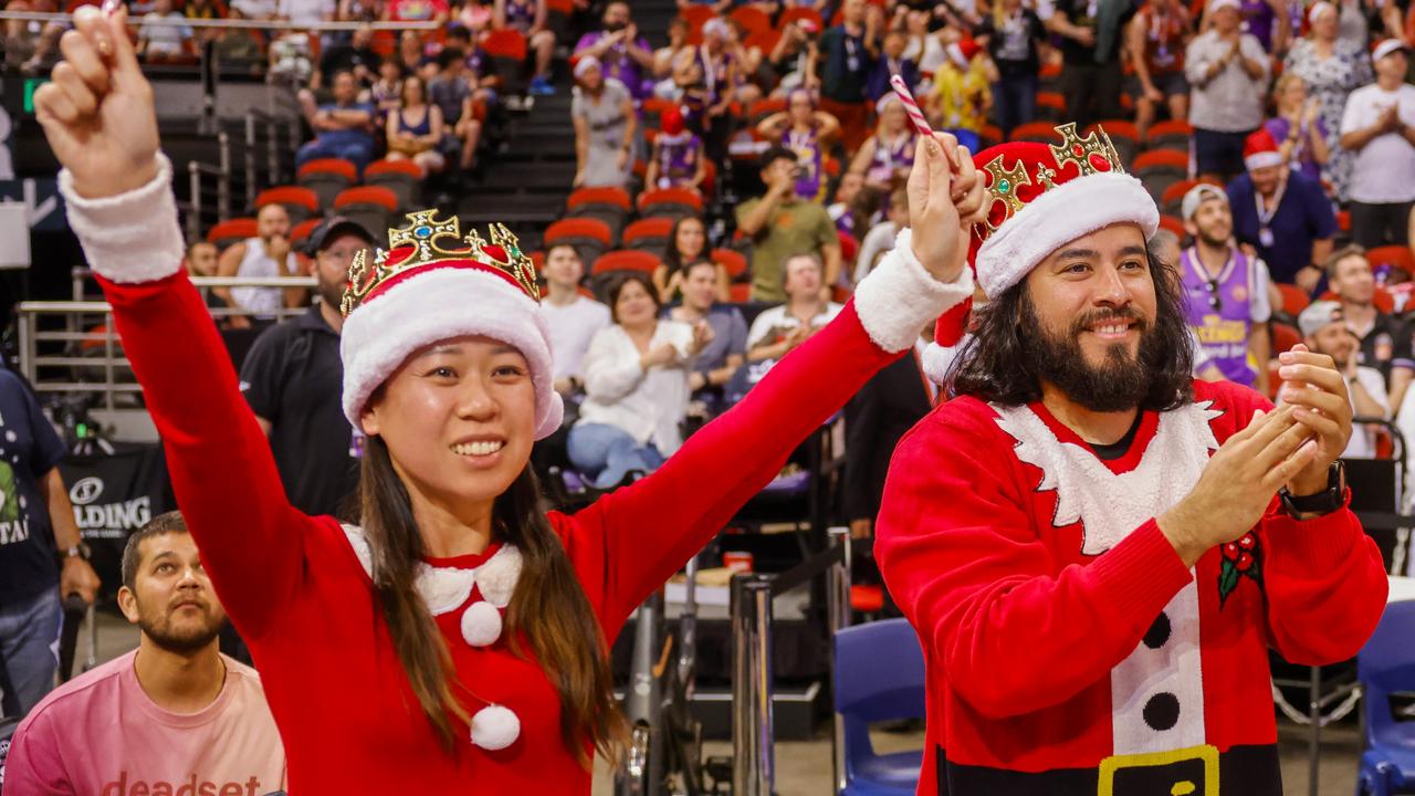 Kings fans dressed in Santa outfits soak up the atmosphere at their first ever Christmas Day game. Picture: Jenny Evans/Getty Images