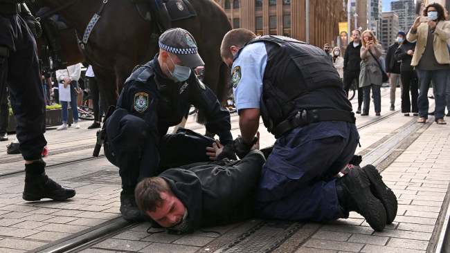 Police have clashed with protesters and made multiple arrests at an illegal anti-lockdown rally in Sydney. Picture: NCA