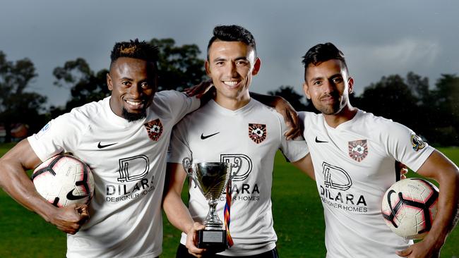 Ghan Kilburn City teammates Ibby Kamara, captain Javeed Zamini and Masoud Teymouri. Picture: Naomi Jellicoe