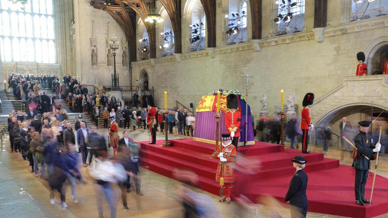 Members of the public file past the coffin of Queen Elizabeth II (Photo by Marko Djurica - WPA Pool/Getty Images)