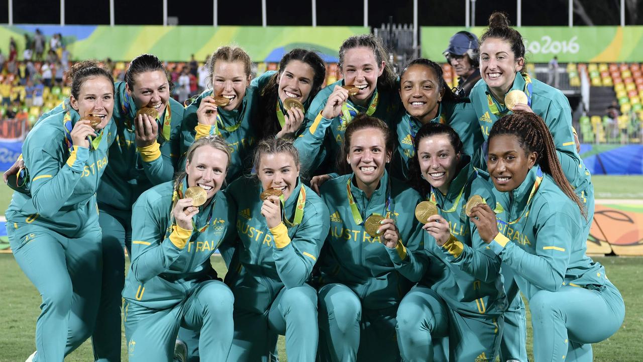 Australia’s women’s rugby sevens squad celebrate their gold medal win in Rio.