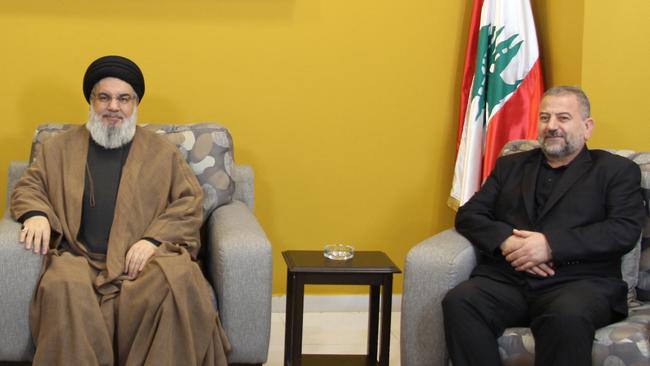 Hassan Nasrallah during a meeting with the deputy chief of the Palestinian Hamas movement, Saleh al-Aruri, at an undisclosed location in Lebanon. Picture: AFP