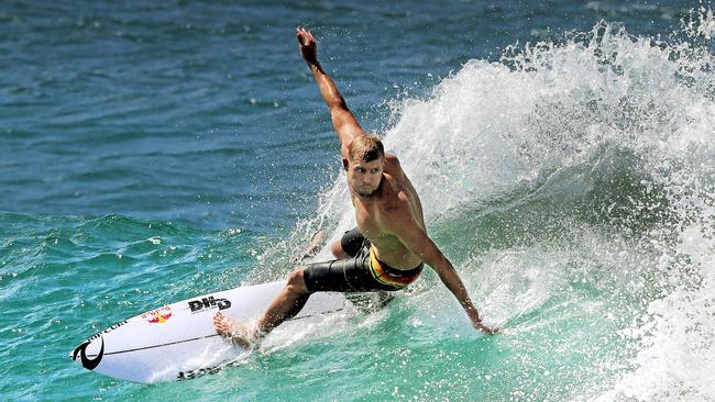 World class surfers including 3 time world champ Mick Fanning hit the waves at Snapper Rocks as the swell from Cyclone Winstin arrived. Pic by Luke Marsden.