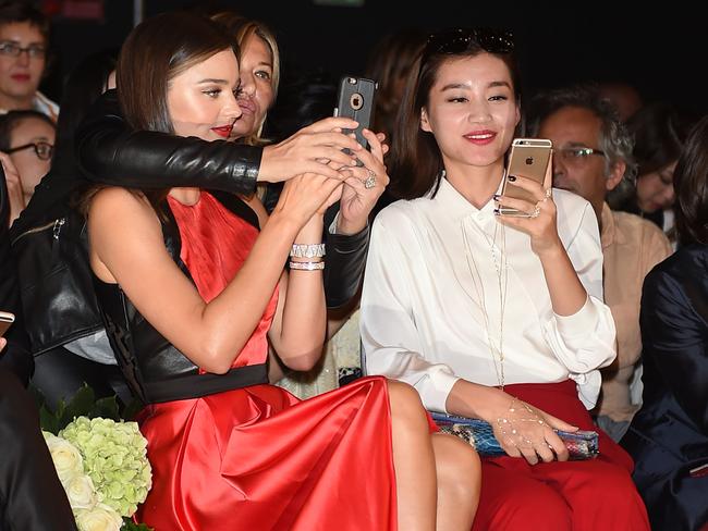 Selfie time with the fashion set at the La Koradior show at Milan Fashion Week. Picture: Splash News Australia