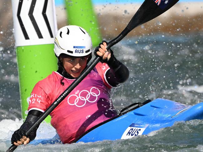 Australia's Noemie Fox competes in the women's kayak cross final of the canoe slalom competition at Vaires-sur-Marne Nautical Stadium in Vaires-sur-Marne during the Paris 2024 Olympic Games on August 5, 2024. (Photo by Bertrand GUAY / AFP)