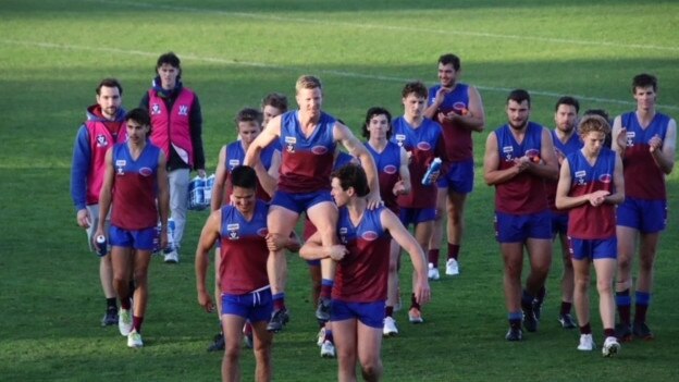 Horsham Demons favourite son Brad Hartigan is chaired off after his 300th match in the Wimmera league. Picture: Lauren McKinnon