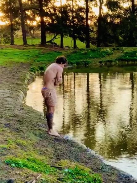 Harley Balic prepares to jump into a dam on a near-freezing day. Picture: Harley Balic/Facebook