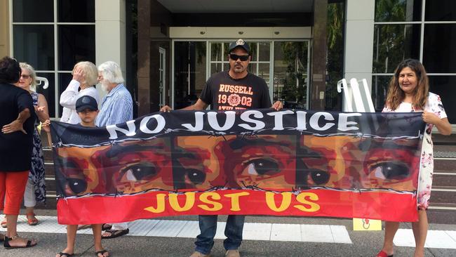 Protesters gather outside a hearing of the Royal Commission into the Protection and Detention of Children in the Northern Territory at the Supreme Court in Darwin.