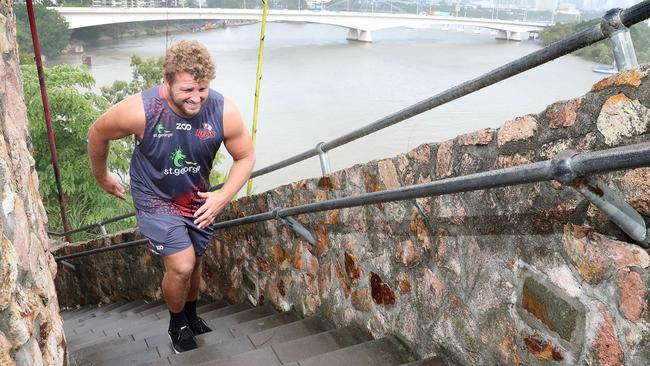 Reds prop James Slipper walking the Kangaroo Point Cliffs stairs as part of his recovery. Photographer: Liam Kidston.