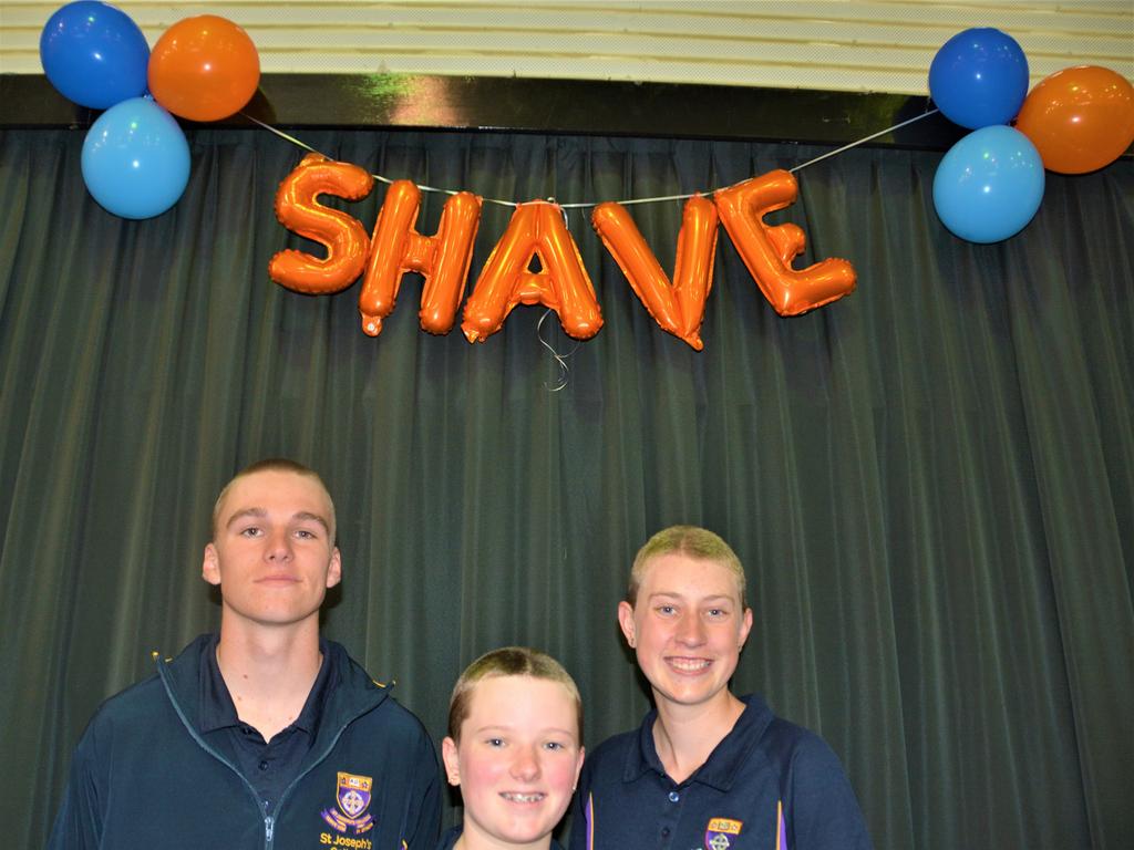 At the St Joseph's College 2023 World's Greatest Shave event are (from left) Charlie Kruger, Meghan Ellis and Emily Chandler. Picture: Rhylea Millar