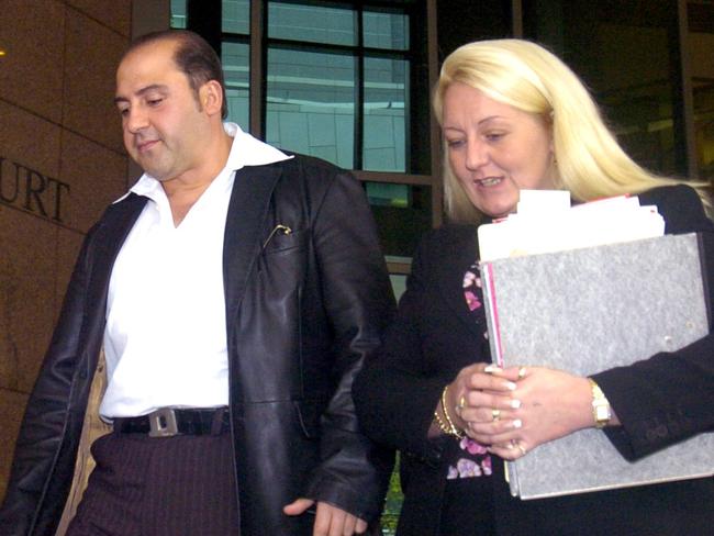 Tony Mokbel  leaves Melbourne Magistrates Court with his lawyer, Nicola Gobbo.